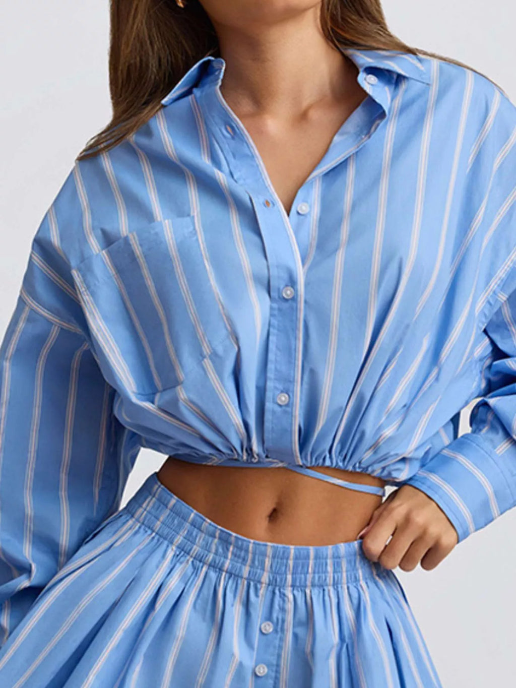Shopimist striped button-up shirt and shorts set, featuring a stylishly coordinated casual outfit with vertical stripes and lightweight fabric.