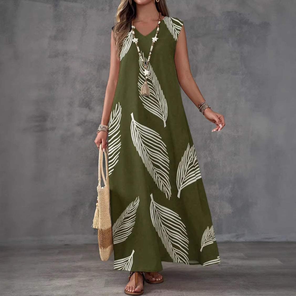 Printed V-neck sleeveless high-waist maxi dress by FitiqueFit in three colors, shown laid flat with floral print and flowing fabric.
