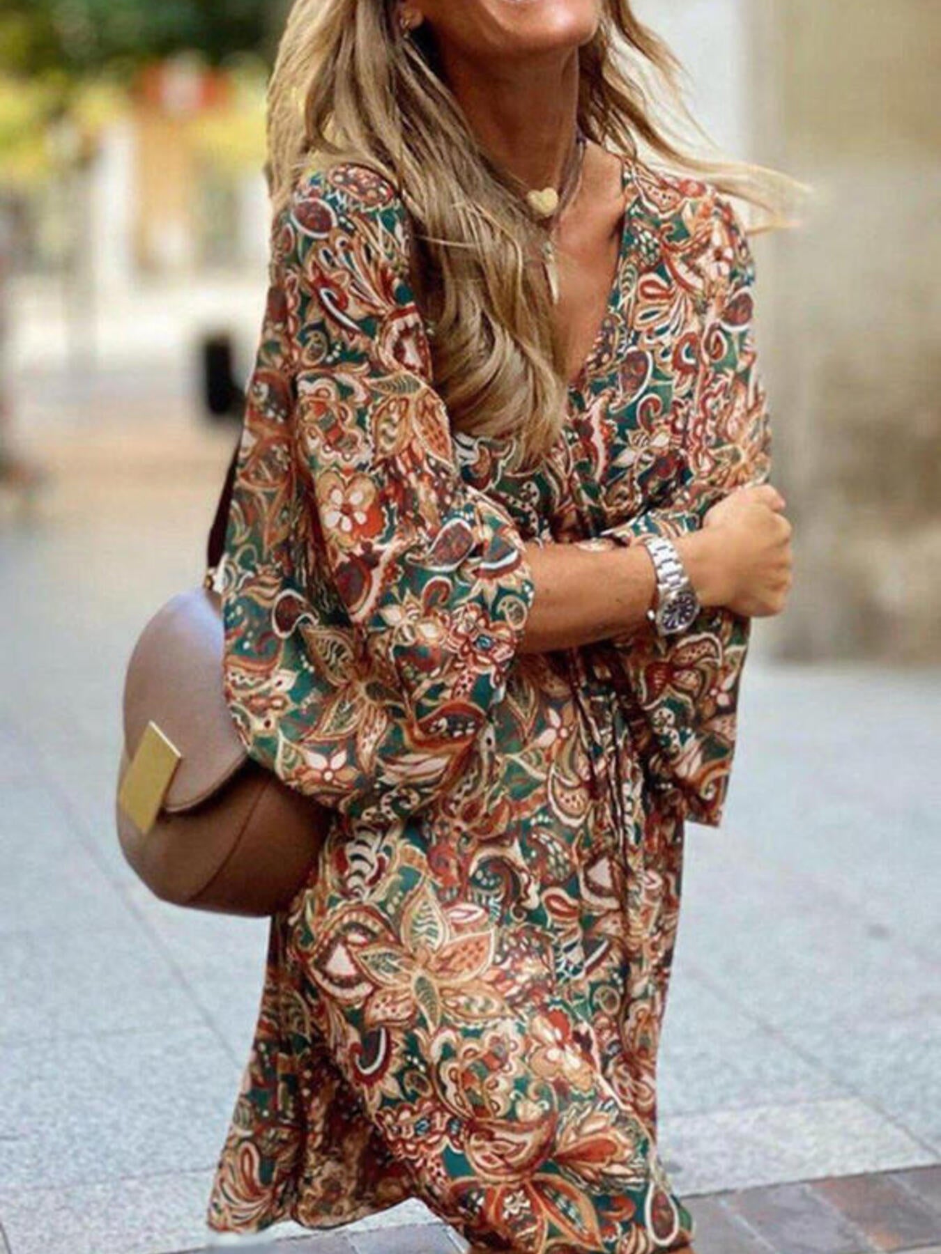 Plush Fashion Hub paisley print balloon sleeve mini dress with boho style, featuring a flowy silhouette and vibrant pattern.