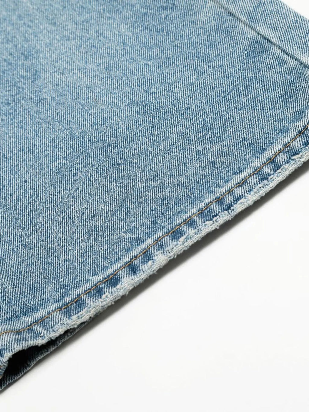 Men's loose fit jeans from Trendsi, showcasing casual denim with a relaxed fit, front pockets, and classic five-pocket design.