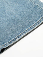 Men's loose fit jeans from Trendsi, showcasing casual denim with a relaxed fit, front pockets, and classic five-pocket design.
