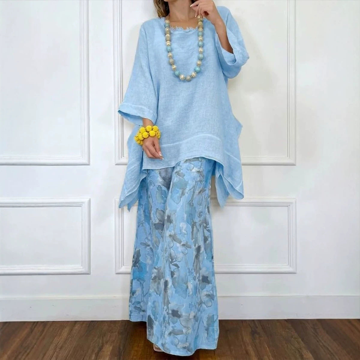 FitiqueFit irregular hem drop-shoulder top and wide-leg pants set in three colors, featuring a relaxed fit and stylish design.