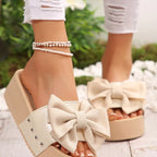 Women's chic bow decor platform sandals from Trendsi, featuring comfortable flat walking shoes with stylish bow accents and open toe design.