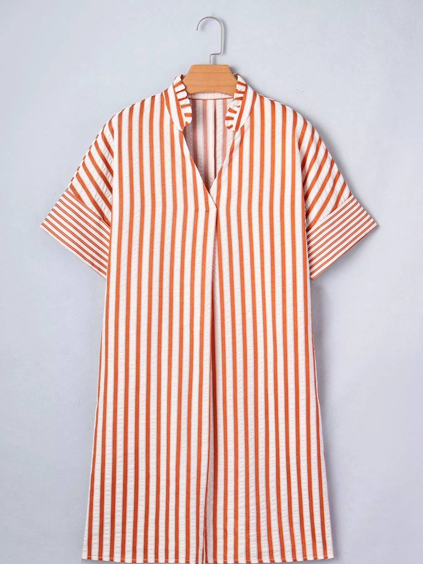 Plush Fashion Hub stripe pinched V-neck mini dress with turn-up cuffs and pockets, casual and stylish for modern women.