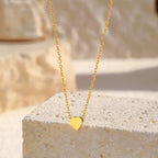 18K gold-plated heart pendant necklace with delicate chain, featuring a shiny, romantic heart charm, stylish jewelry from Shopimist.