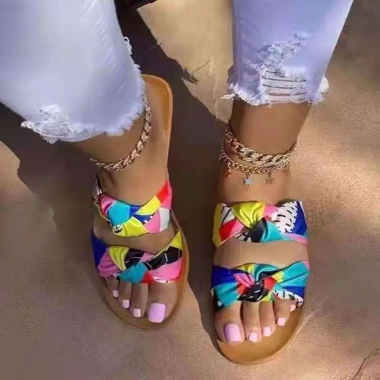 Women's bowknot toe flat sandals by Trendy Attic Store01, featuring a stylish bow detail and comfortable flat sole.