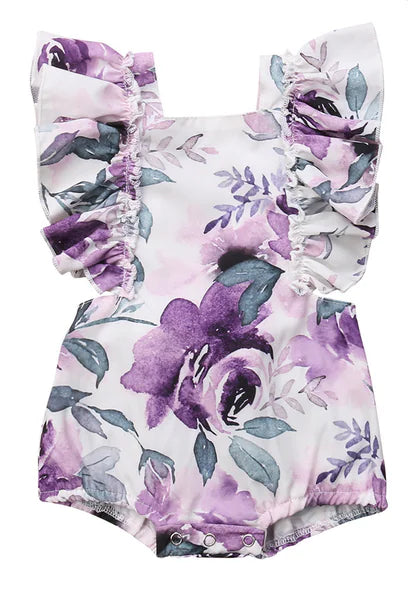 Girls' floral two-piece outfit with back tie and matching headband, featuring a colorful floral print and cute design.