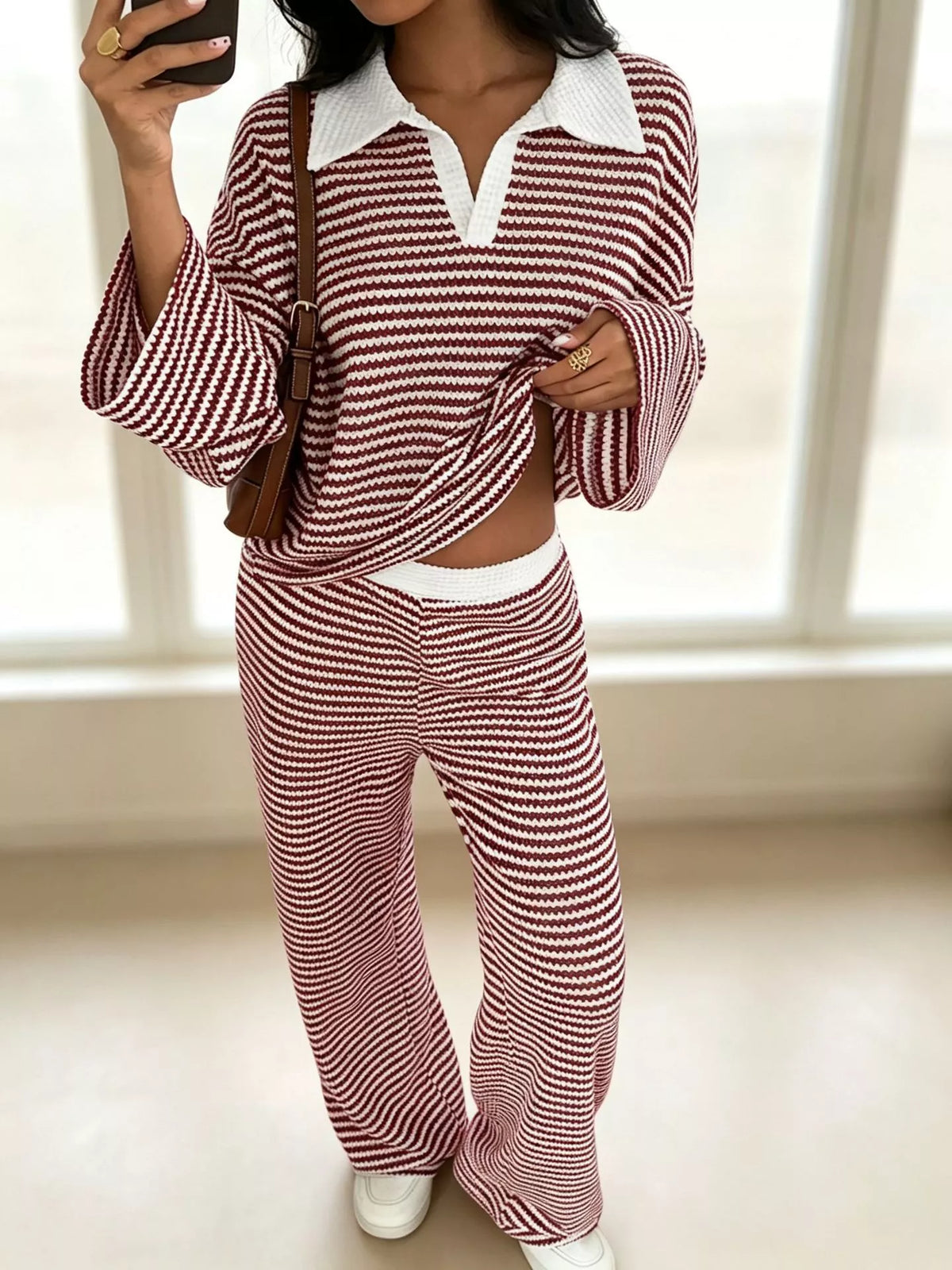 Striped long sleeve polo and wide-leg pants set by Trendsi, featuring a stylish, coordinated casual outfit.