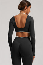 Fitglutes Activewear long sleeve crop top and matching leggings, 2-piece set, designed for gym and workout activities.