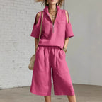 Casual two-piece set with short-sleeve shirt and loose shorts from Plush Fashion Hub, displayed on a model.