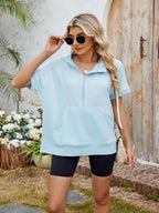 Half zip short sleeve hooded top from Trendsi, featuring a casual design with a front half zipper and hood, perfect for everyday wear.
