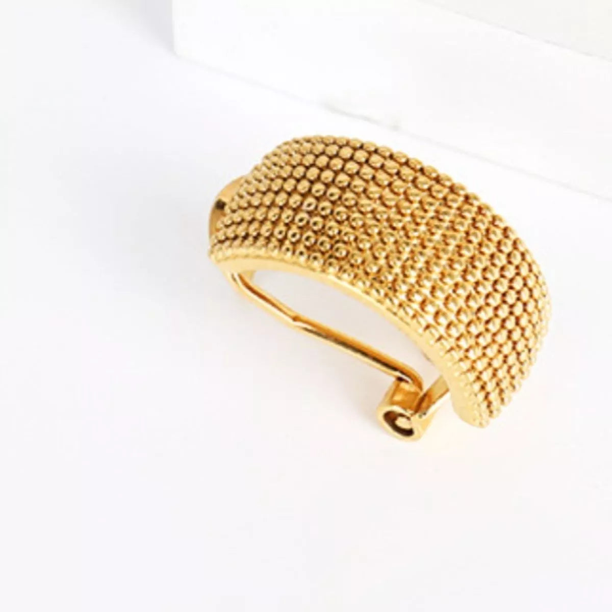 Gold-plated textured wide band hoop earrings featuring a bold, stylish design, perfect for adding a touch of elegance to any look.