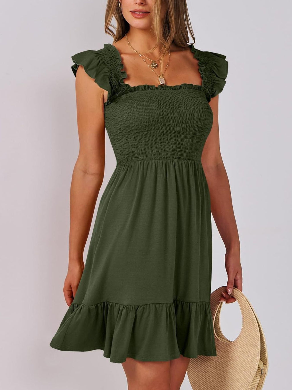 Women's smocked ruffle hem mini dress by Trendsi, casual lightweight summer dress with a flowy design and ruffled hem.