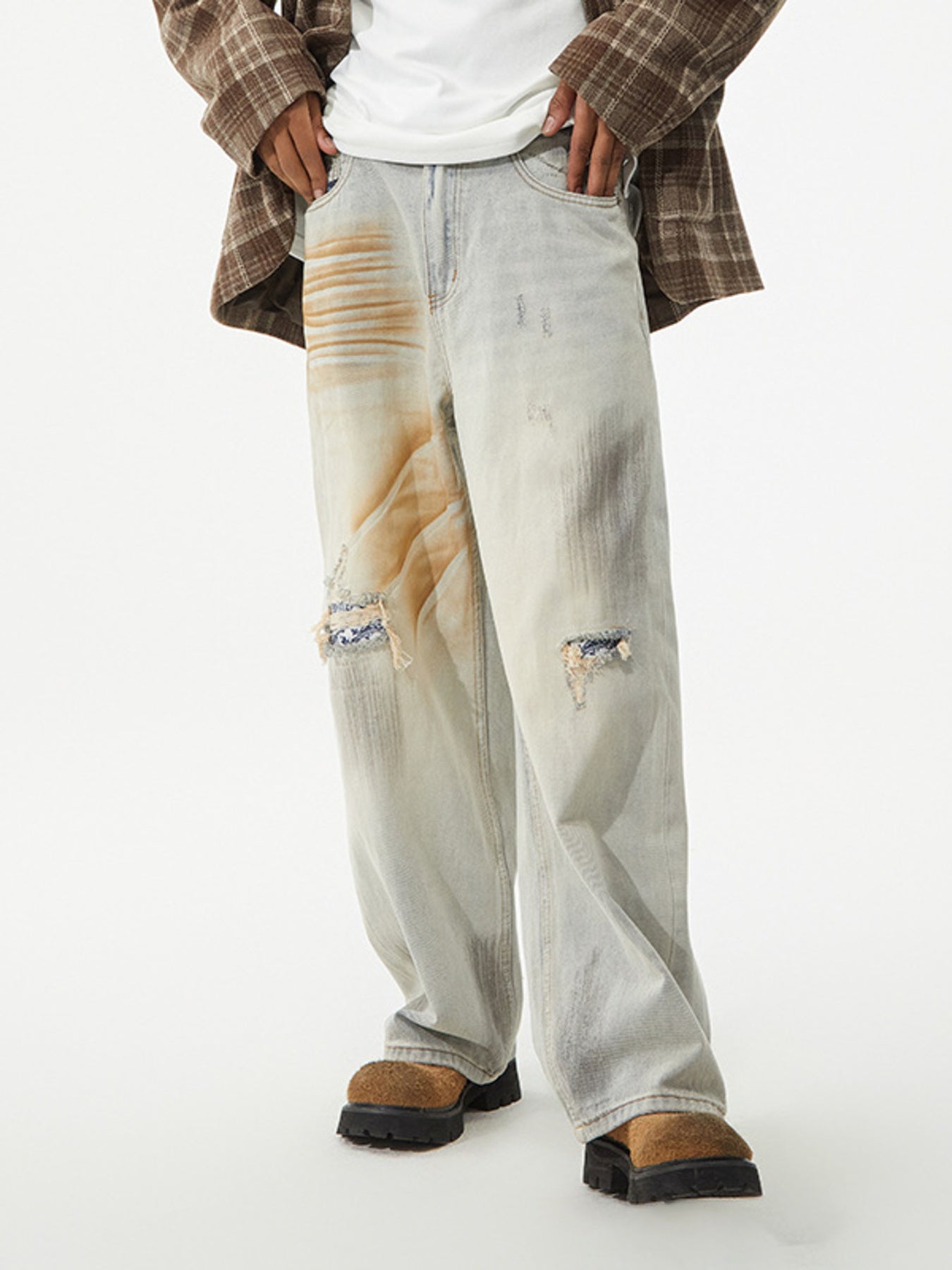 Men's distressed wide leg jeans by Trendsi featuring a casual fit and faded denim look.