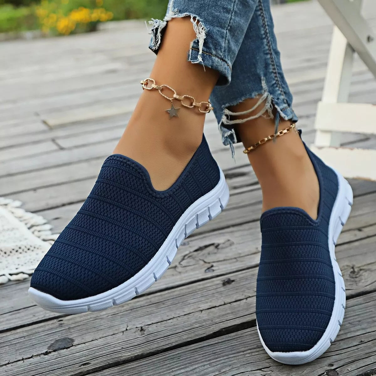 Women's breathable mesh slip-on casual flats by Trendsi, lightweight walking shoes with comfortable, breathable design.