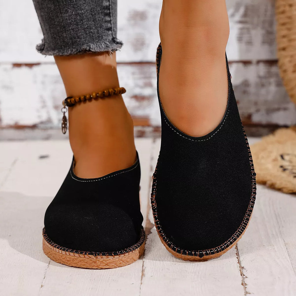 Shopimist round toe flats slip-ons with a sleek design, featuring comfortable slip-on style and classic footwear for women.