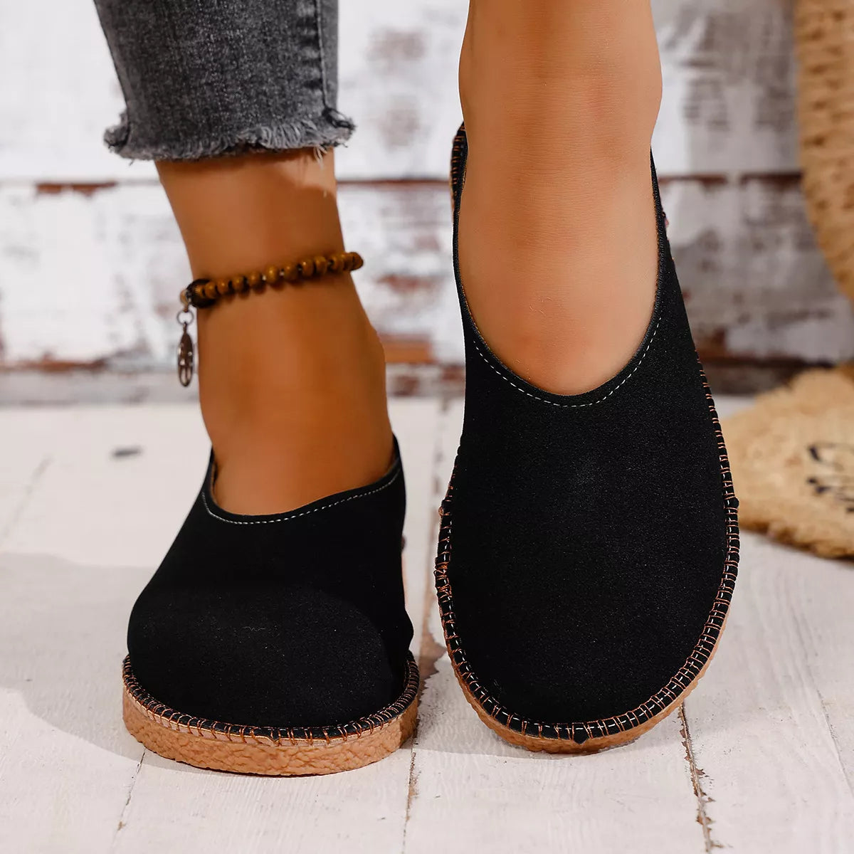 Round toe slip-on flats by Plush Fashion Hub featuring a sleek design and comfortable fit, perfect for casual or office wear.