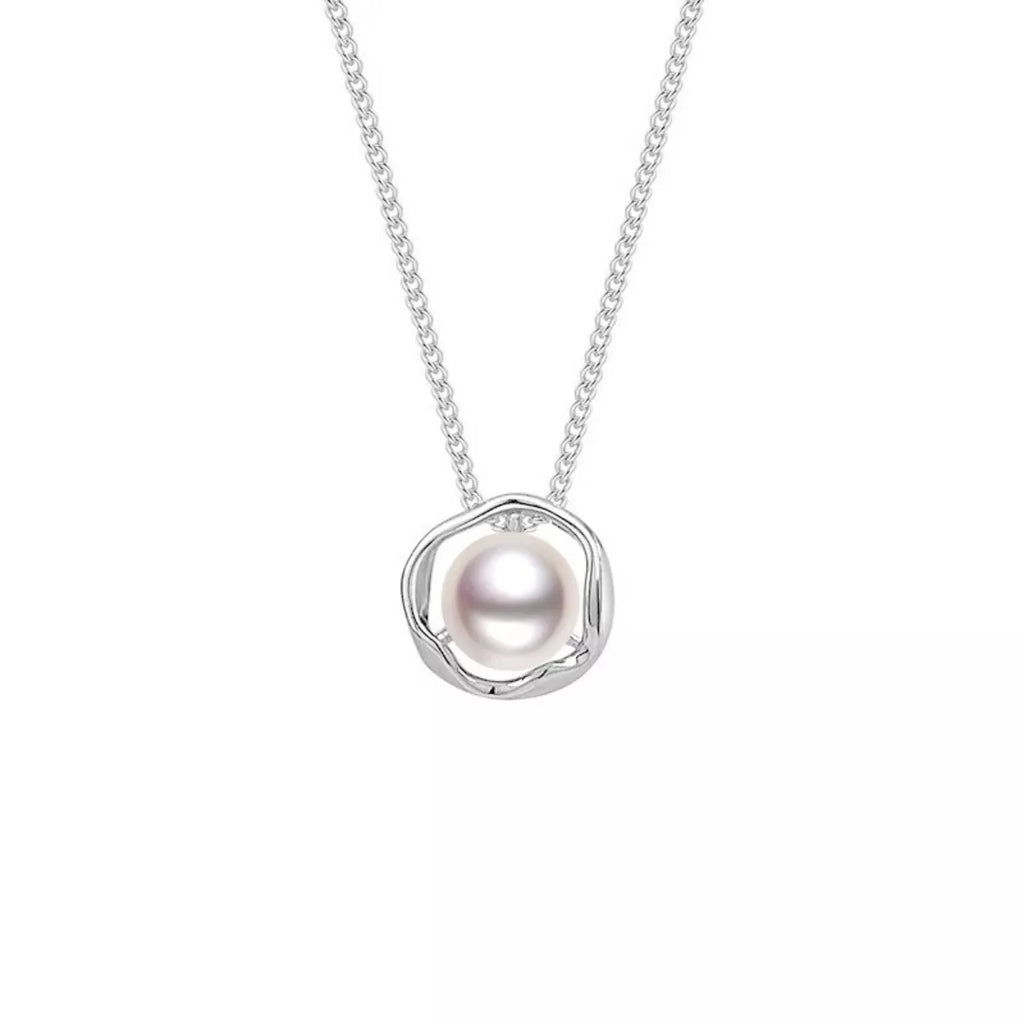 Sterling silver pearl pendant necklace with a delicate design, featuring a lustrous pearl on a fine silver chain.