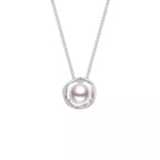 Sterling silver pearl pendant necklace with a delicate design, featuring a lustrous pearl on a fine silver chain.