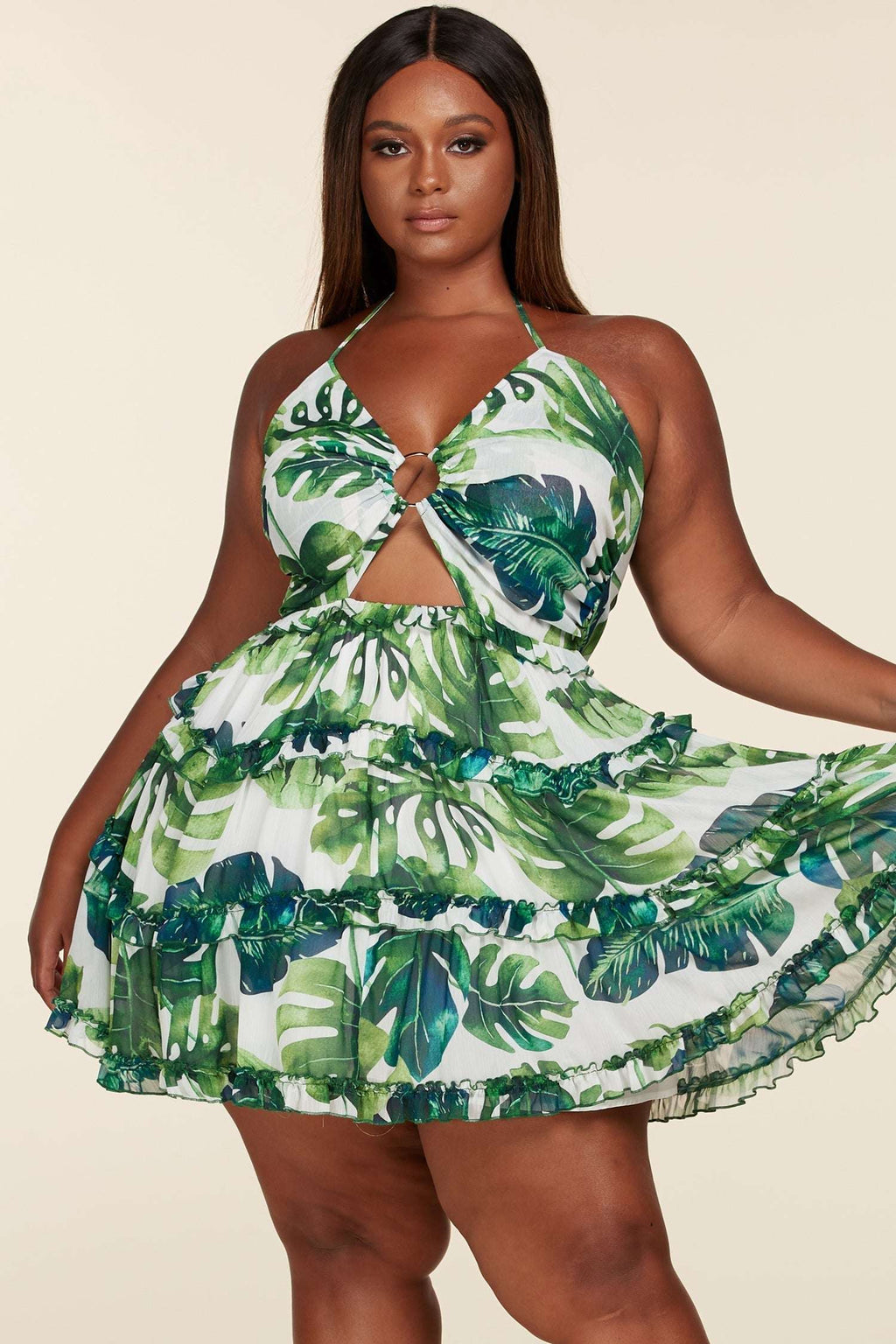 Fasheabe plus size leaf print O-ring mini dress showcasing a vibrant leaf pattern and stylish O-ring details.
