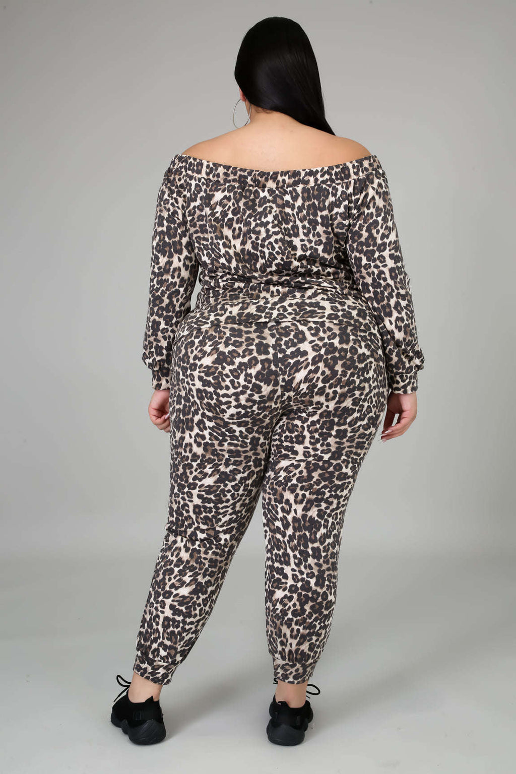 Fasheabe off-the-shoulder cheetah print jogger set featuring a relaxed fit top and matching pants, stylish animal print design.