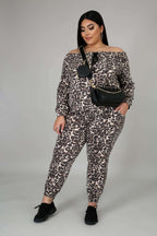 Fasheabe off-the-shoulder cheetah print jogger set featuring a relaxed top and matching pants, stylish animal print design.