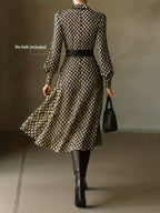 Elegant long sleeve floral ruffled midi dress by Trendsi, featuring a printed fall design and feminine style.
