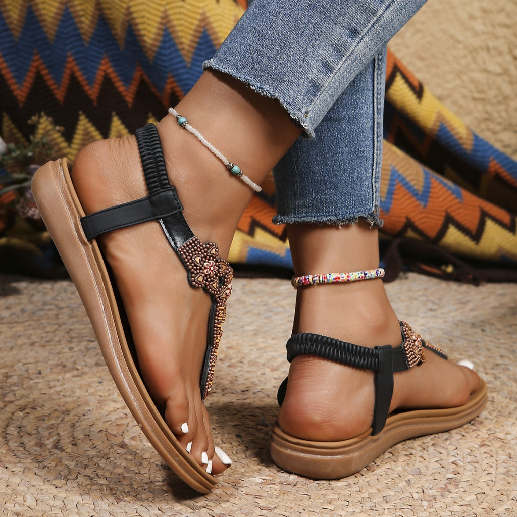 Bohemian rhinestone beaded thong sandals with elastic ankle strap, flat comfortable shoe by Trendsi, perfect for summer wear.
