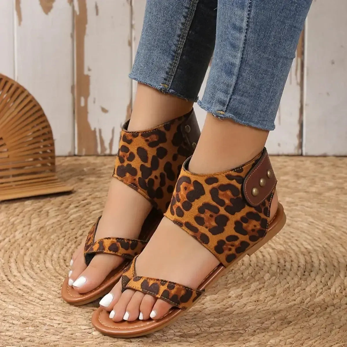 Women's faux leather ankle strap flat sandals by Trendsi, featuring comfortable design and stylish open-toe shoe for casual wear.