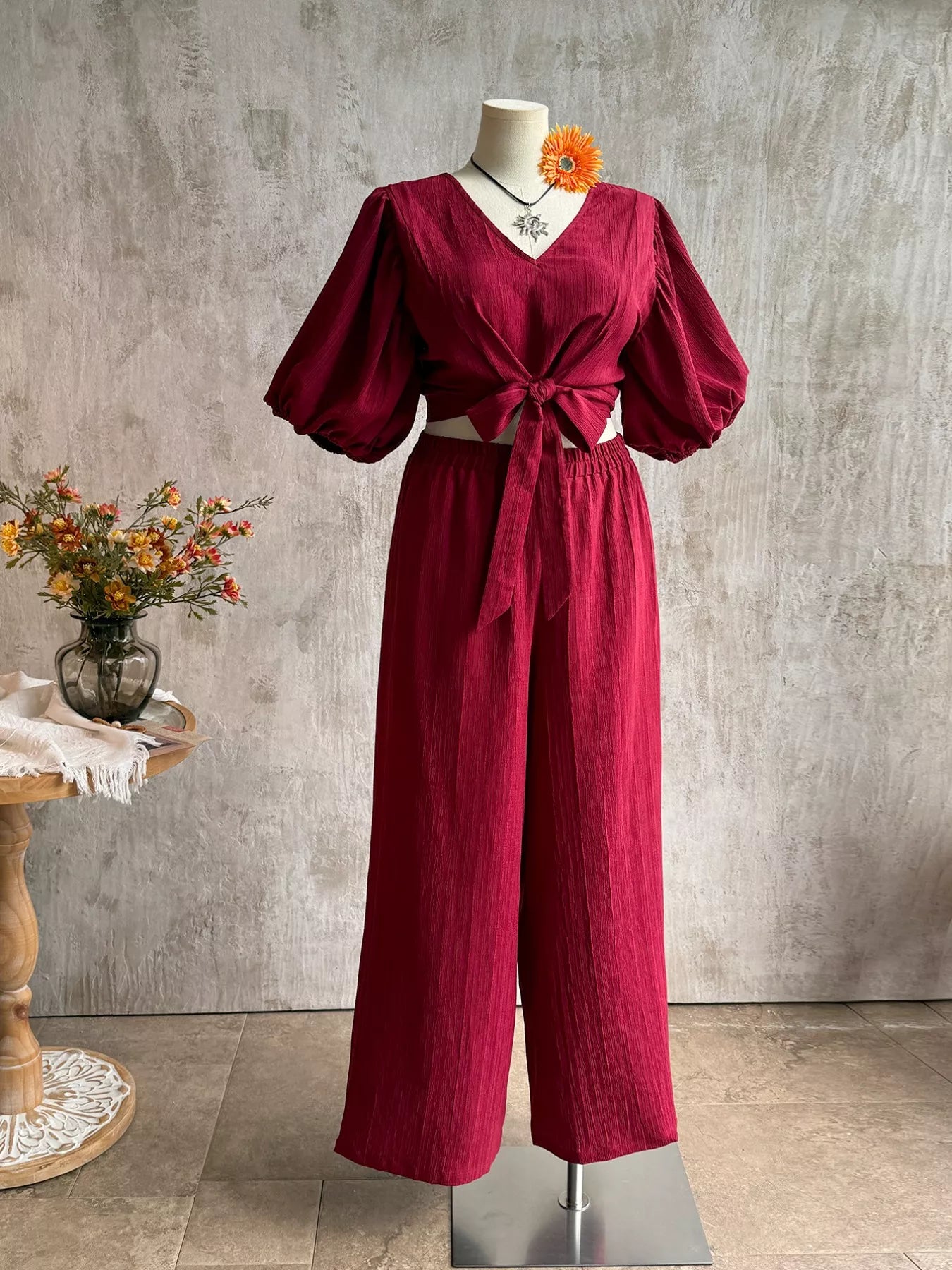 Plus size tie-front puff sleeve top and wide-leg pants set by Plush Fashion Hub, featuring a stylish two-piece outfit with trendy details.