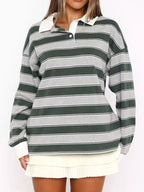 Striped long sleeve polo top with button details from Trendsi, featuring a classic design and versatile style.