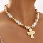 Pearl and cross pendant necklace featuring a pearl and silver cross charm, stylish jewelry from Shopimist.