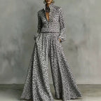 Leopard print wide-leg pants set for women by FitiqueFit, casual two-piece outfit with relaxed fit and bold animal print design.