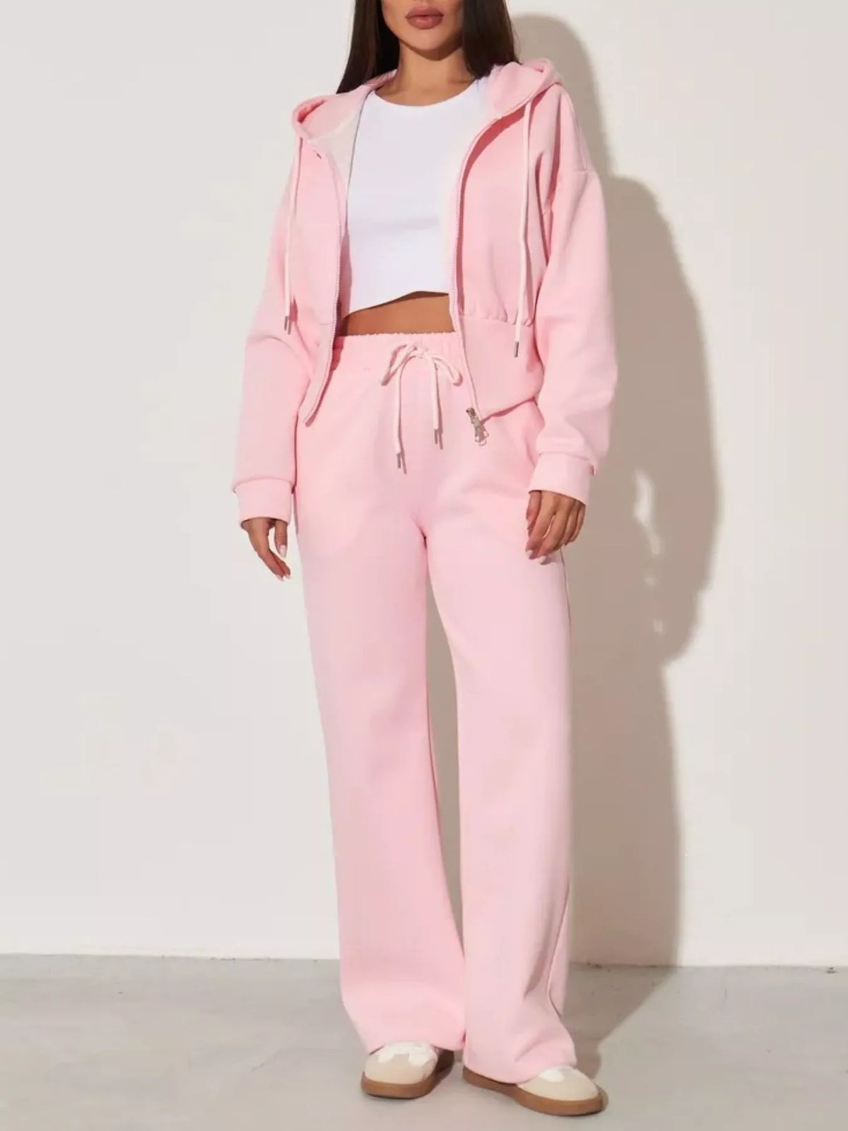 Plush Fashion Hub zip-up hoodie and wide-leg pants loungewear set, featuring a cozy hoodie and relaxed fit pants in soft fabric.