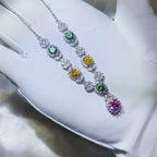Sterling silver necklace with a 3.5 carat moissanite gemstone, elegant jewelry piece with a delicate chain and sparkling stone.