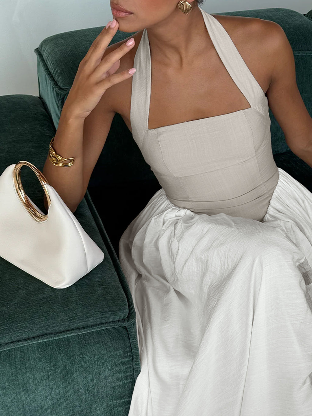 Elegant two-tone halter neck maxi dress with ruched details and pockets by Plush Fashion Hub, shown in a stylish full-length view.