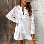 Women's FitiqueFit casualwear set featuring an elegant V-neck lace long sleeve blouse and matching shorts.