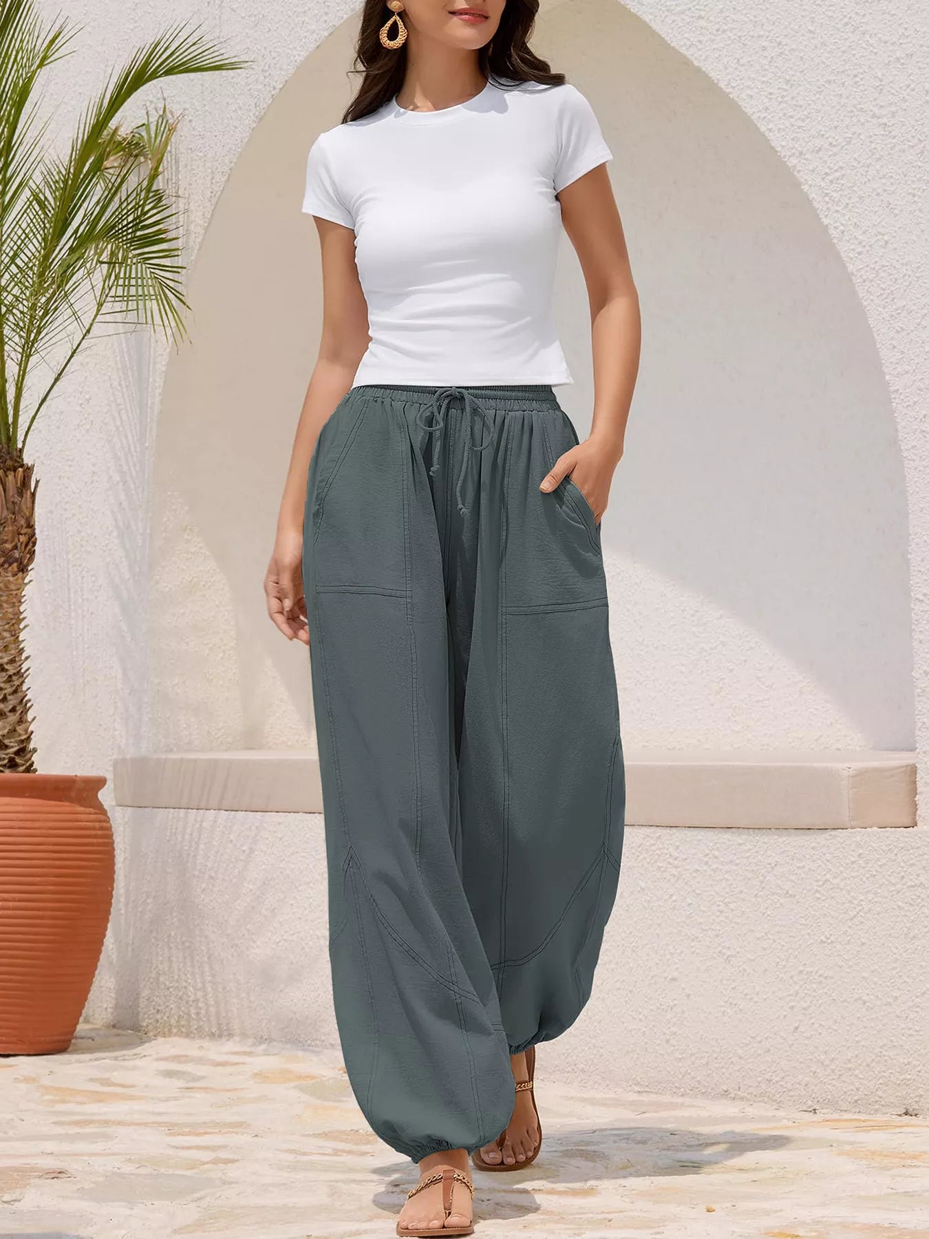 Casual loose-fit drawstring waist harem joggers by Trendsi, featuring relaxed fit and comfortable design, shown in the image.