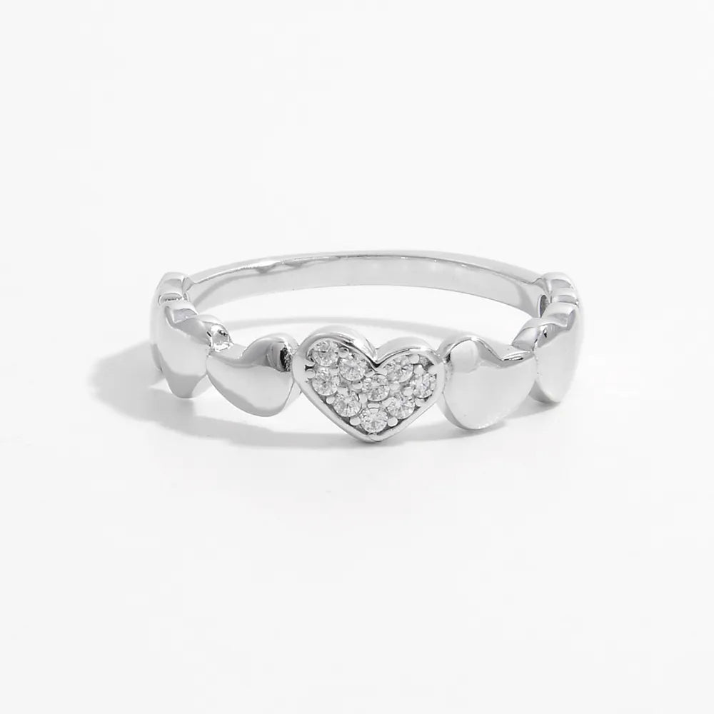 925 sterling silver ring with a zircon heart design, showcasing a delicate and elegant jewelry piece.