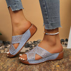 Women's rhinestone open toe wedge sandals by Trendsi, featuring a comfortable mid-heel and sparkling embellishments.