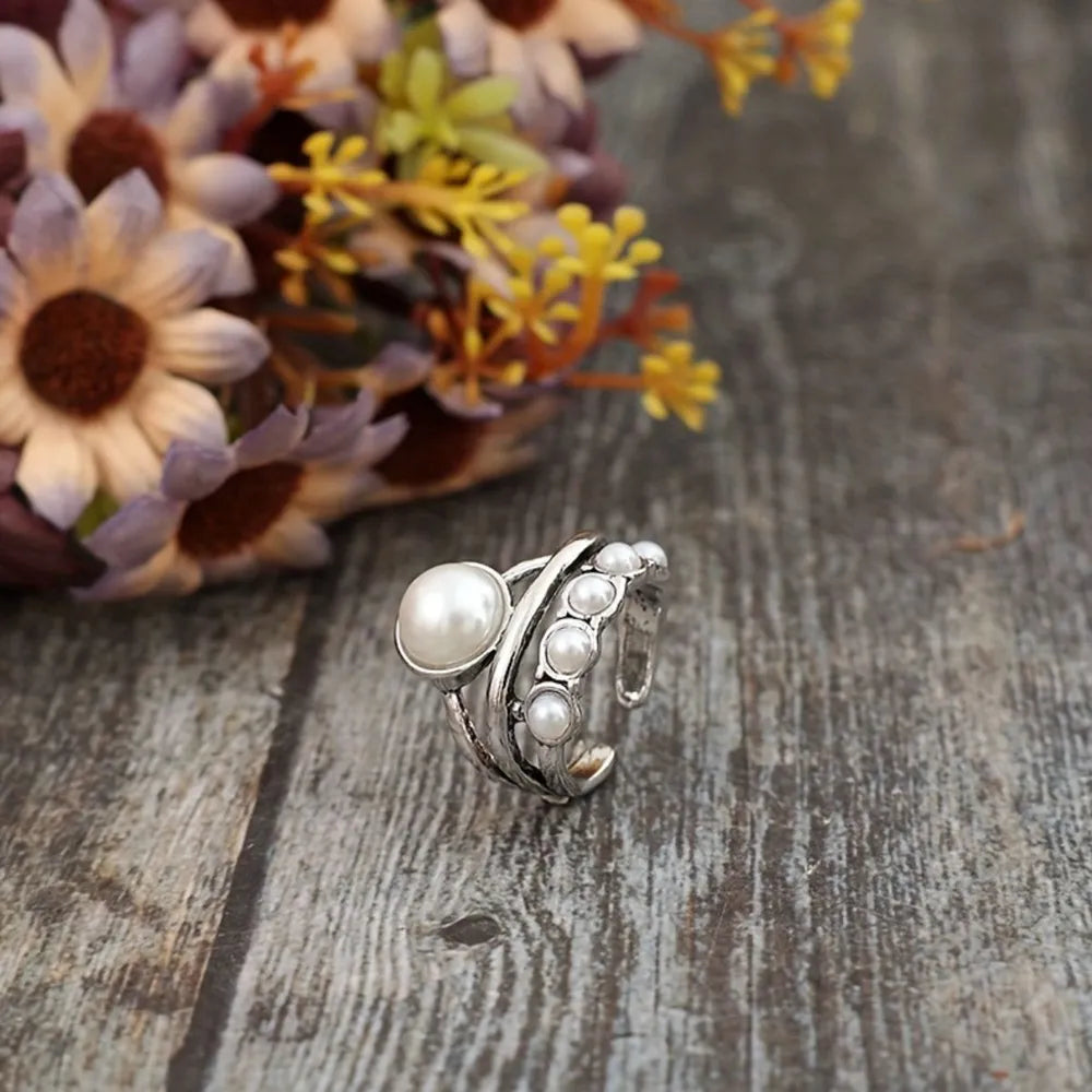 Elegant alloy three-layered open ring from Plush Fashion Hub showcasing layered design and polished finish.