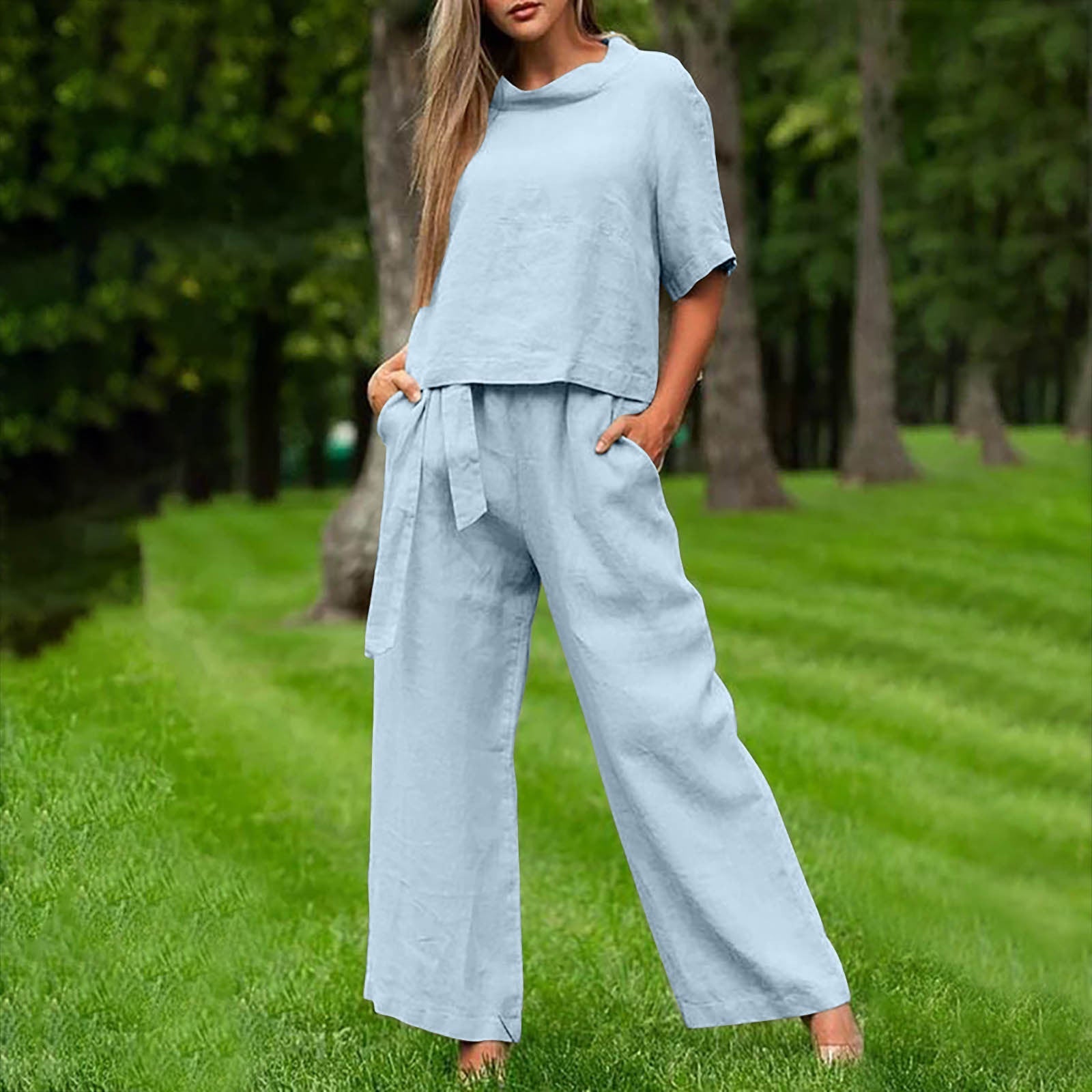 FitiqueFit activewear two-piece set with round-neck 3/4 sleeve top and matching pants in six colors, available in sizes S–XXL.