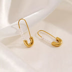 Shopimist Safety Pin Pearl Accent Earrings featuring gold-tone safety pins with elegant pearl embellishments.