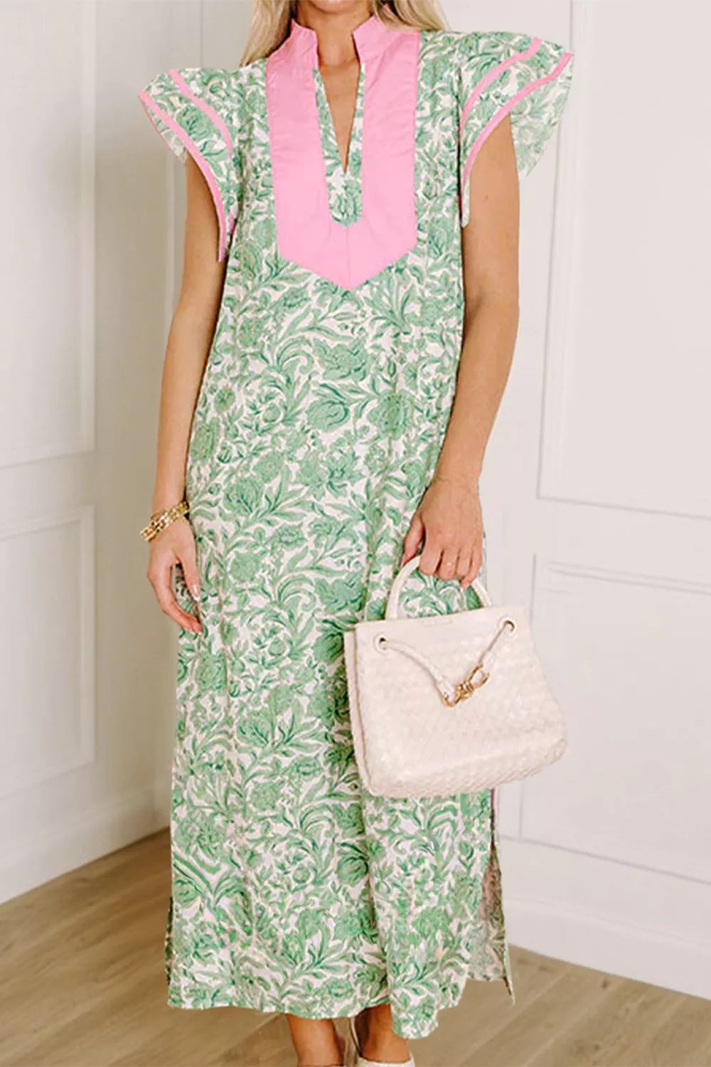 Contrast trim flutter sleeve floral midi dress by Plush Fashion Hub, featuring a flowy silhouette and vibrant floral pattern.