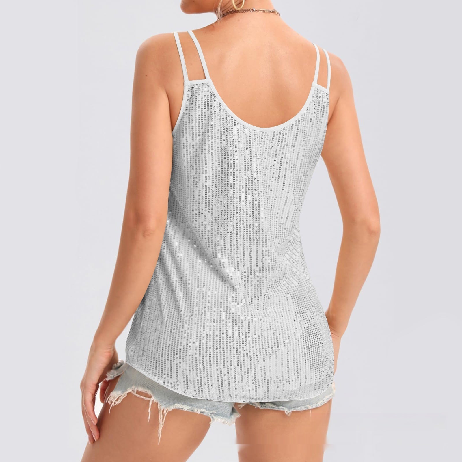Sparkly sequin V-neck camisole with rhinestone straps, casualwear top from Plush Fashion Hub featuring a shiny, sparkly design.