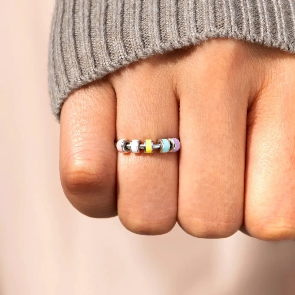 925 Sterling silver oil drip ring with a sleek, modern design, showcasing a shiny, polished finish and intricate detailing.