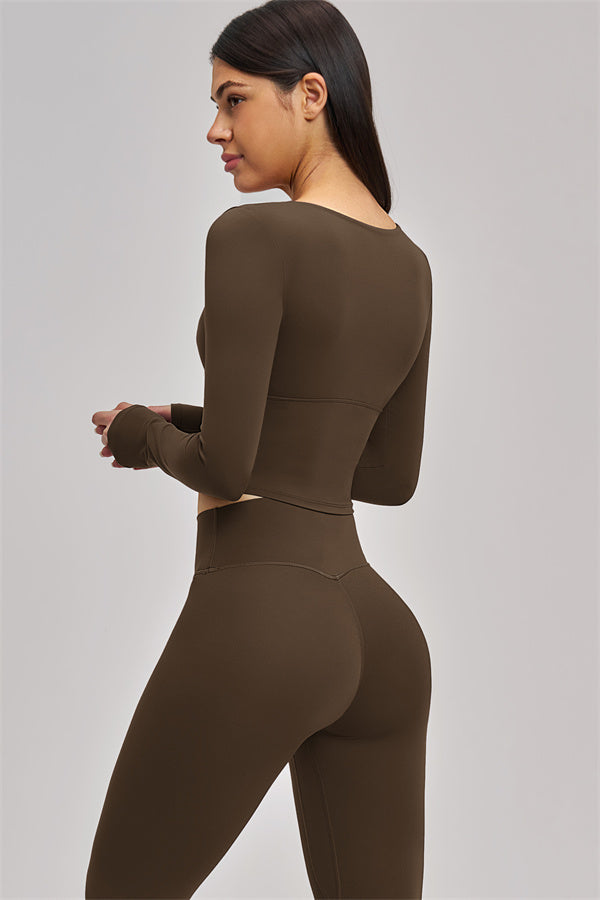 Fitglutes Activewear long sleeve crop top from The Swoon collection, shown in black with fitted style and crew neckline.