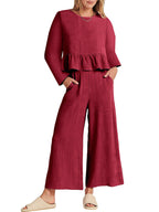 Women's ruffled hem long sleeve top and pants lounge set with pockets, stylish and comfortable 2-piece set by Trendsi.