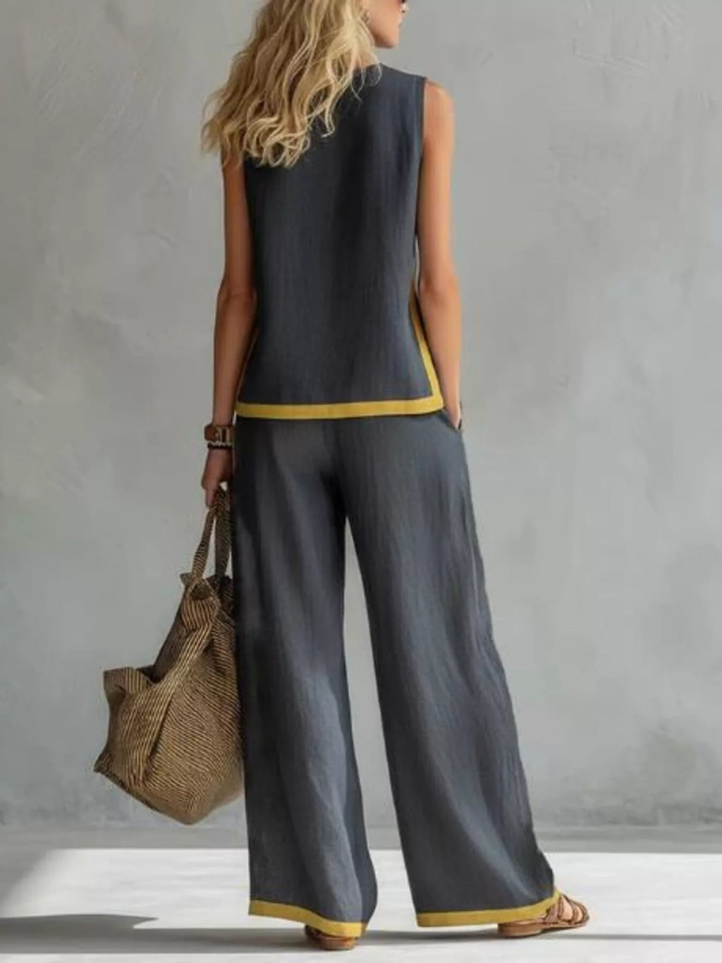 Plus size contrast stripe sleeveless top and wide-leg pants set by Plush Fashion Hub, stylish coordinated outfit on a model.