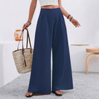 Women's high-waist wide-leg trousers with pockets, full length, by Plush Fashion Hub, shown on a model.
